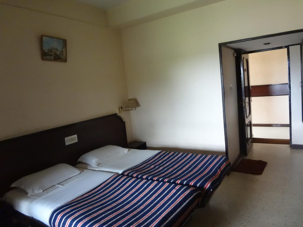 Hotel New Rajdarshan 마디케리 객실 사진